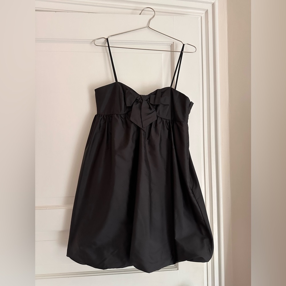 Laundry black silk bubble dress with bow on front.